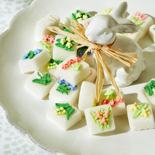 These beautifully hand-decorated sugar cubes feature vibrant floral designs. Each gift box contains 18 cubes, perfect for elevating any event, from elegant gatherings to your daily cup of tea.