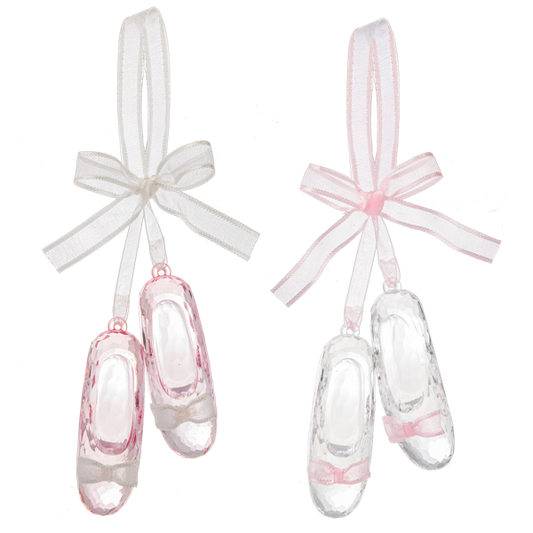 Two pairs of glass slipper ornaments with ribbons on a white background