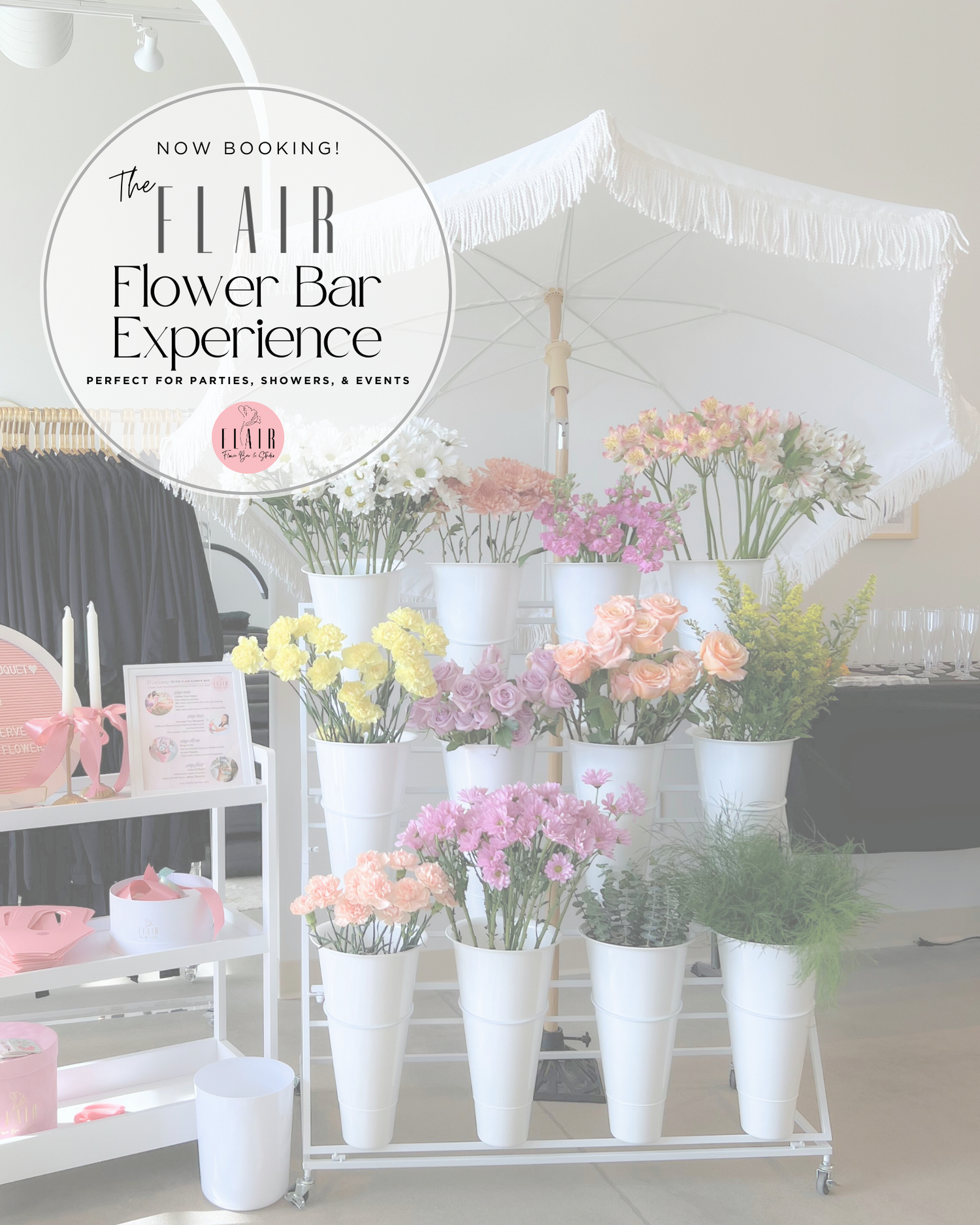 Flair Flower Bar Experience setup with floral arrangements in white vases.