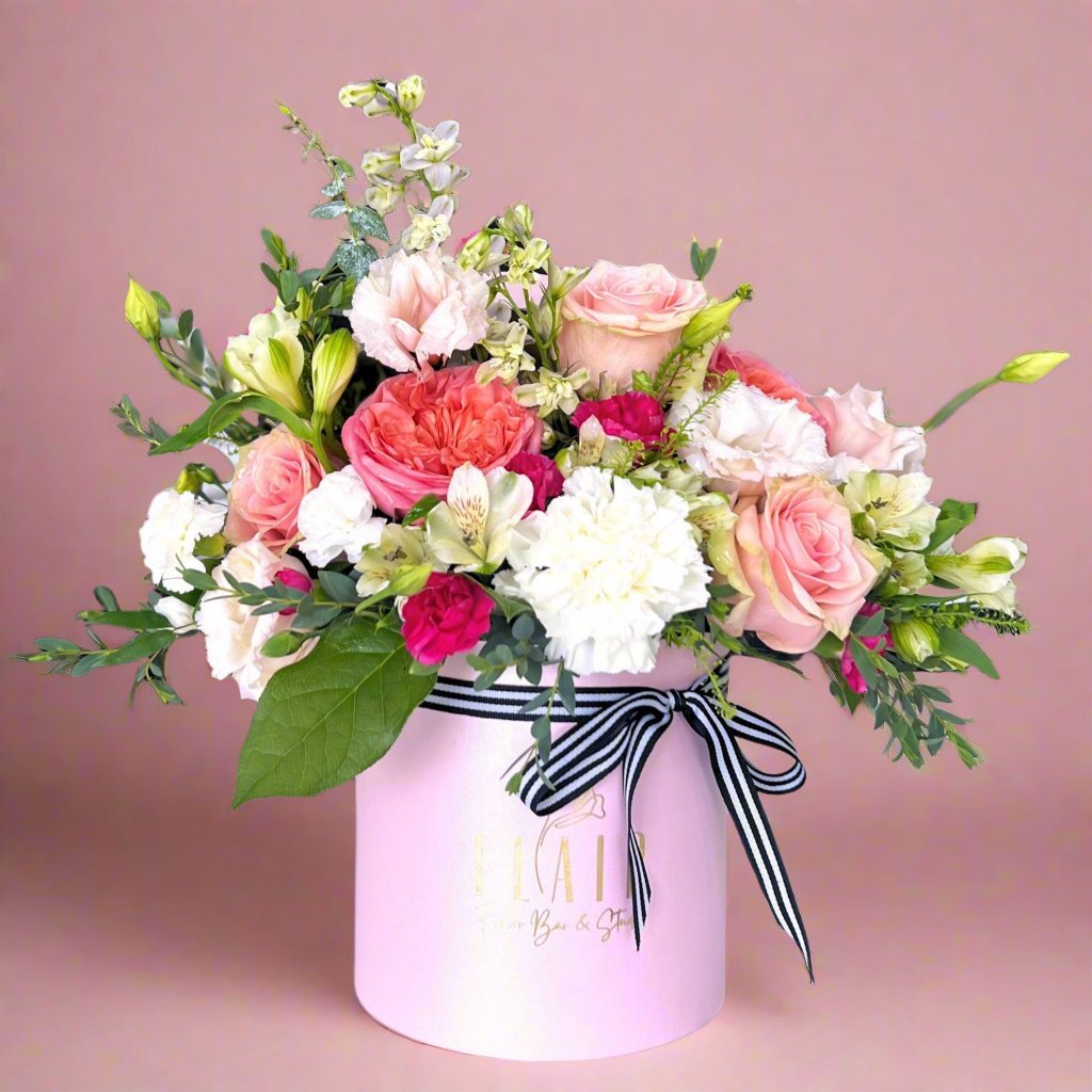 Flair Flower Bar Arrangement in Pink Box with Flair Logo