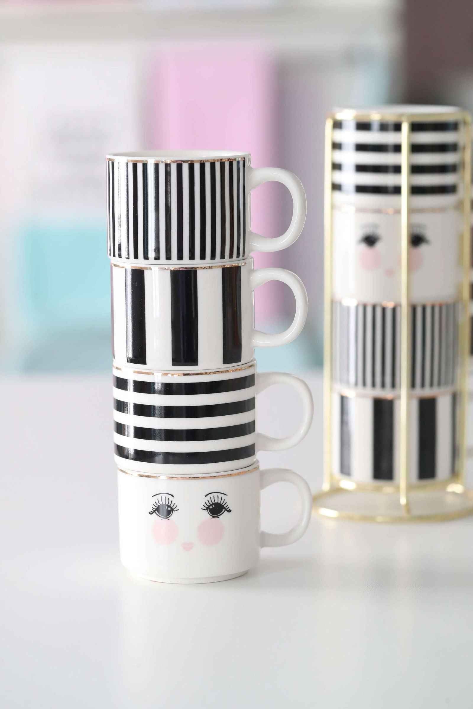 Miss Étoile Espresso mugs in a rack black & white