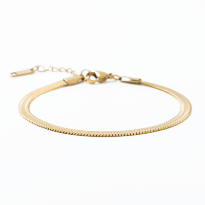 Gold bracelet on a white background