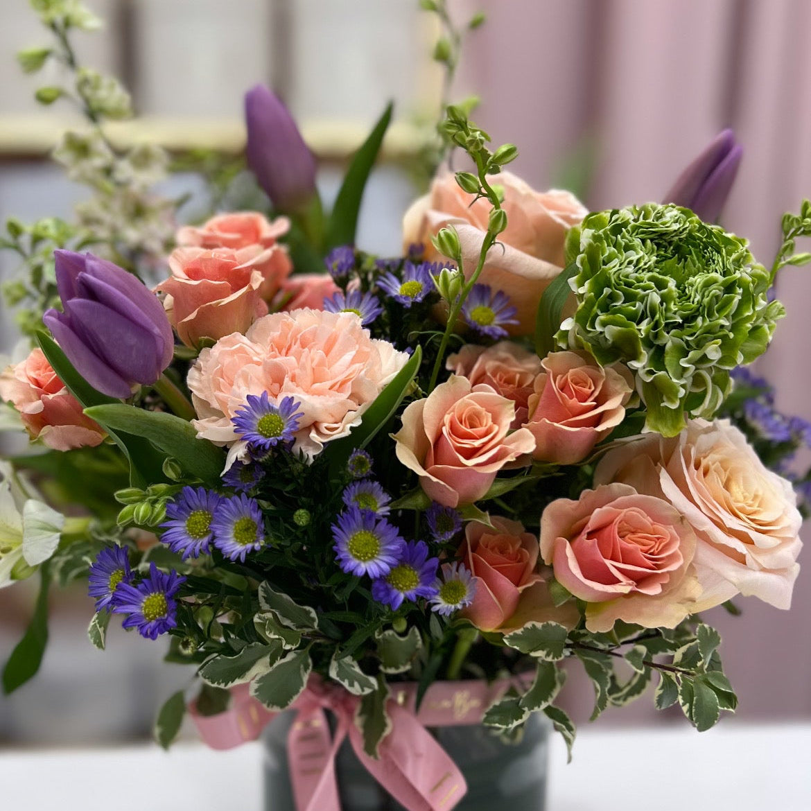 Bouquet of flowers with pink roses, purple tulips, for local deliver in Florence, Ky