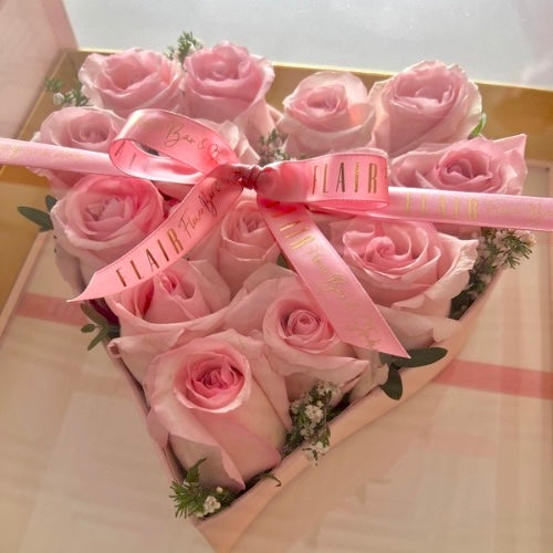 Pink roses in clear box of Blooming Heart Box Arrangement from Flair Flower Bar for delivery in Cincinnati 