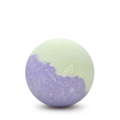 Bath bomb with purple and green gradient on a white background