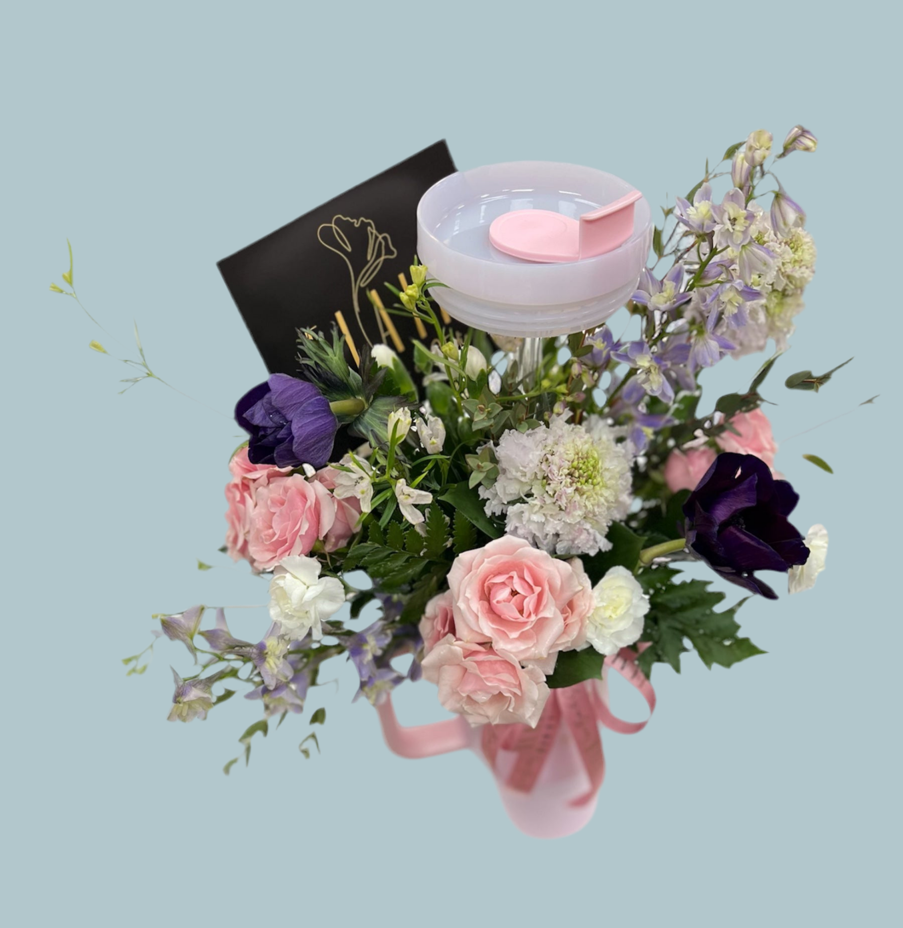 Top view flowers in tumbler cup by Flair Flower Bar