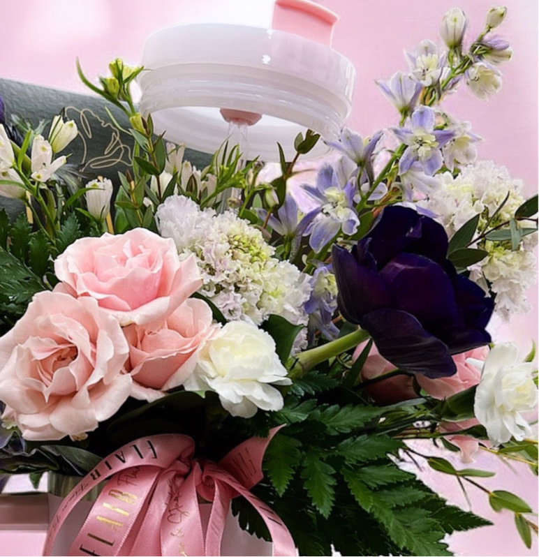 Close up view of flowers in tumbler | Flair Flower Bar