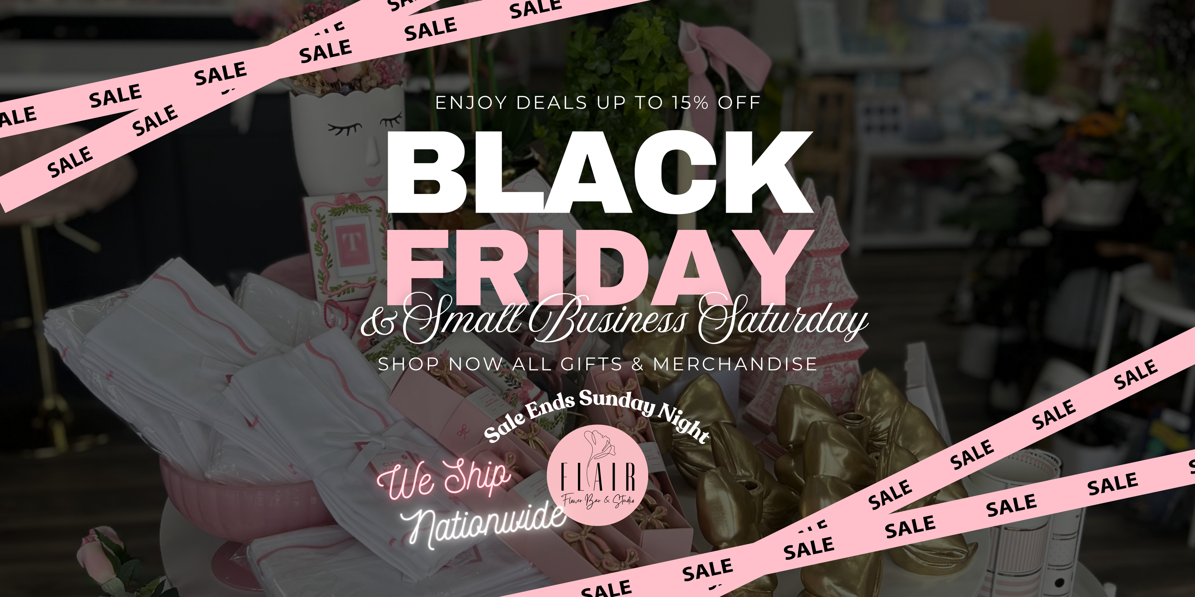 Black Friday sale banner with pink text overlay on a blurred store background and Small Business Saturday with shipping available nationwide