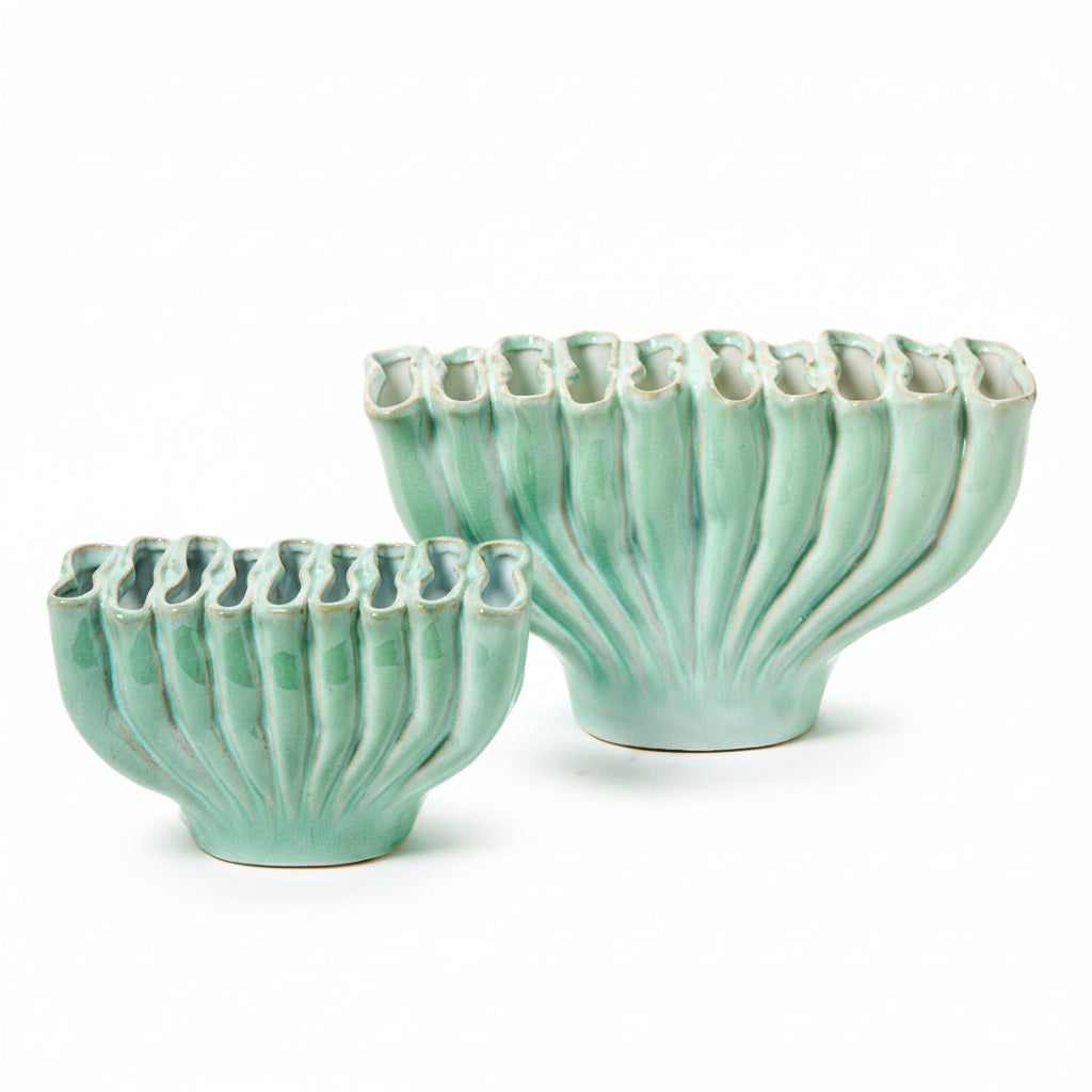 Two ceramic ribbed vases in a glossy mint green glaze, one small and one large, displayed on a clean white background, celadon glaze vases in Florence, Kentucky