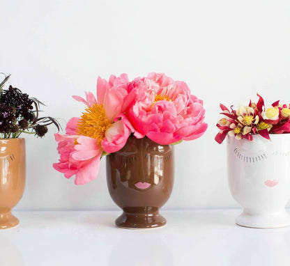 Three ceramic vases with floral arrangements on a white background | Cincinnati Flower Delivery