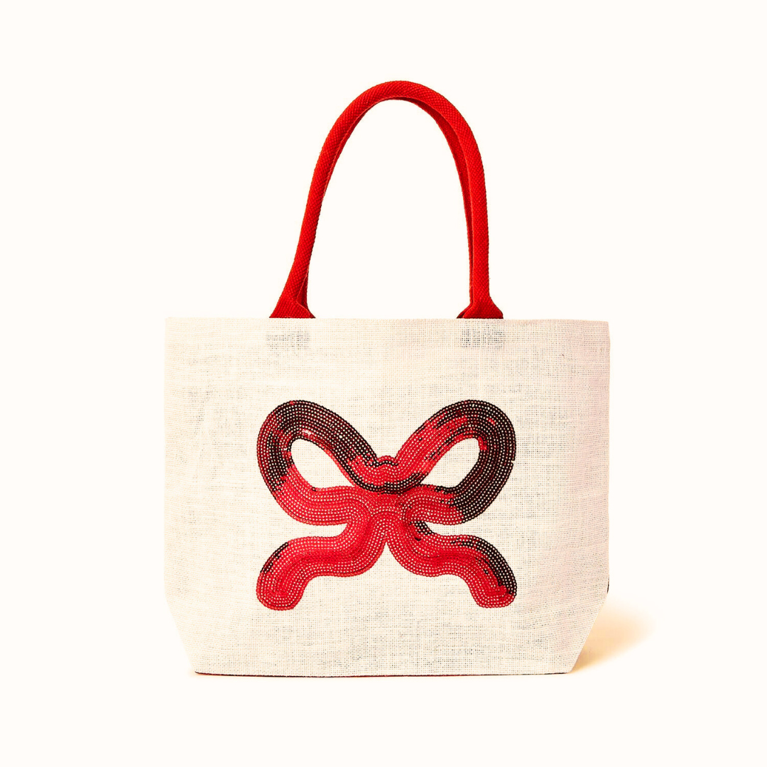 Tote bag with red sequin bow on a white background