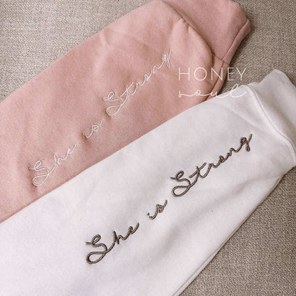 Embroidered She Is Strong Sweatshirt - Flair Flower Bar & Studio