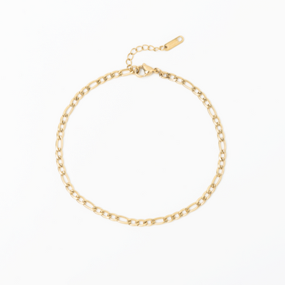 Gold chain anklet on a white background
