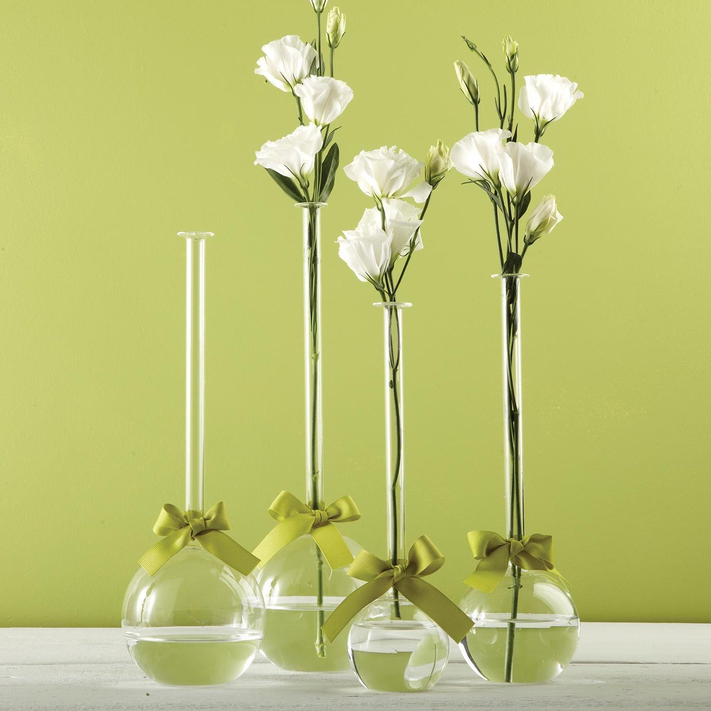 Delicate Budvases with green bow detailing