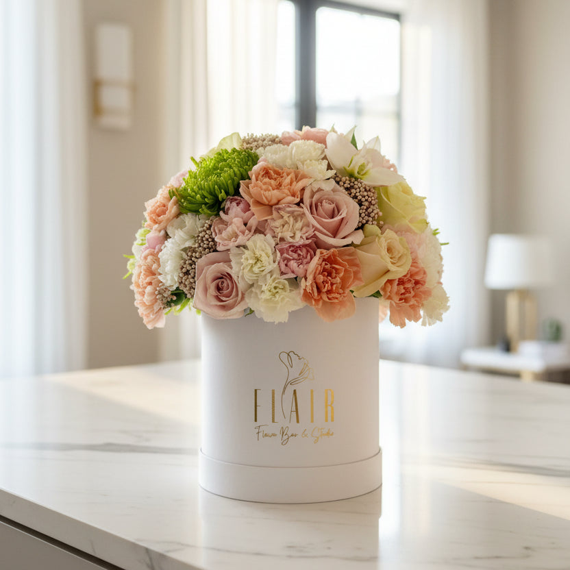 Floral arrangement in a white box from Flair Flower Bar in Florence, Kentucky for local delivery