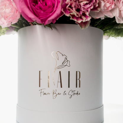 Floral arrangement in a white luxury signature box with Flair Flower Bar & Studio branding in Florence, Kentucky