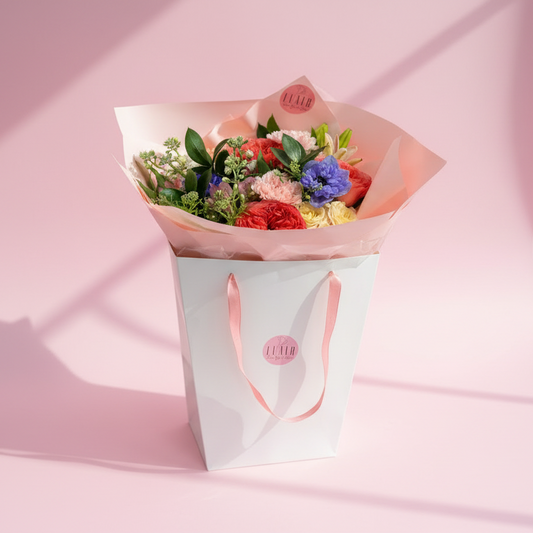 The Maison Wrap Bouquet for Valentine's Day in Pink and White with colorful flowers for delivery in Cincinnati and Northern Kentucky