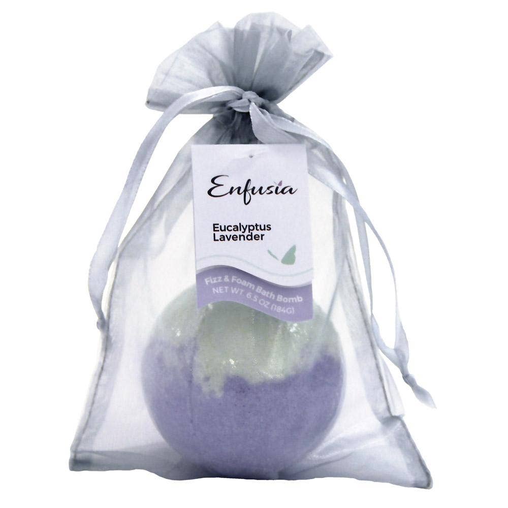 Bath bomb in a clear drawstring bag with Enfusia label on a white background