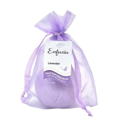 Lavender bath bomb in a purple organza bag with Enfusia branding on a white background