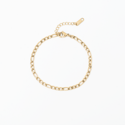 Gold chain bracelet on a white background