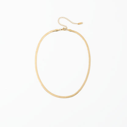 Herringbone Gold necklace on a white background